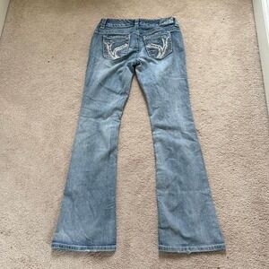 y2k 2000s ariya low rise bootcut jeans w embroidered back pockets